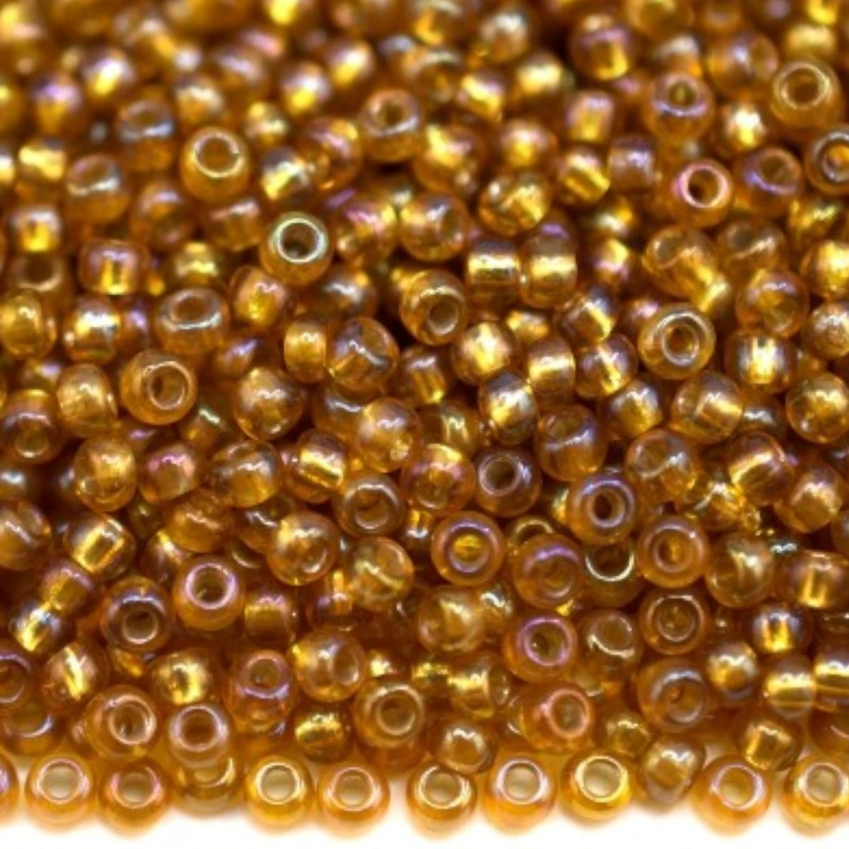 10/0 17059 Preciosa Mărgele din sticlă cehească Rocaille 2.3mm. Topaz transparent, căptușite cu argint, curcubeu.