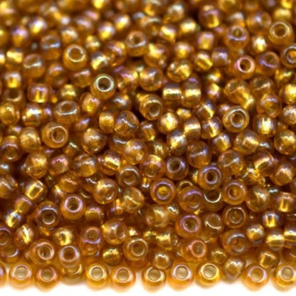 10/0 17059 Preciosa Mărgele din sticlă cehească Rocaille 2.3mm. Topaz transparent, căptușite cu argint, curcubeu.