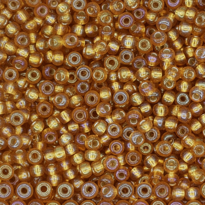 10/0 17079 Preciosa Czeskie szklane Koraliki Rocailles 2.3mm. Topaz Transparent Silver Lined, Tęczowe.