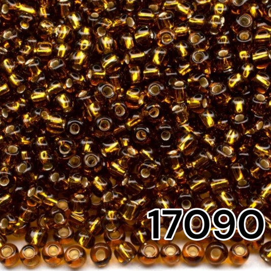 10/0 17090 Preciosa Seed Beads. Brown transparent Silver lined.