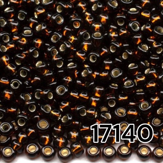 10/0 17140 Preciosa Seed Beads. Brown transparent Silver lined.