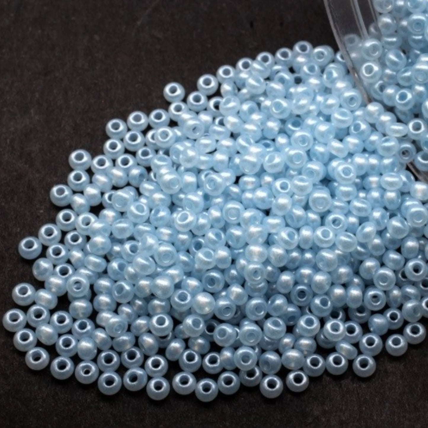 17236 Czech seed beads PRECIOSA round 10/0 light blue. Alabaster - Terra Pearl.