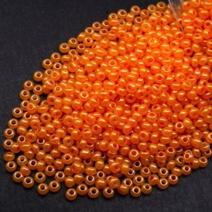 10/0 17389 Preciosa czeskie szklane Koraliki Rocailles 2.3mm. Ceylon pomarańczowy alabastrowa biel z połyskiem – barwione Terra.