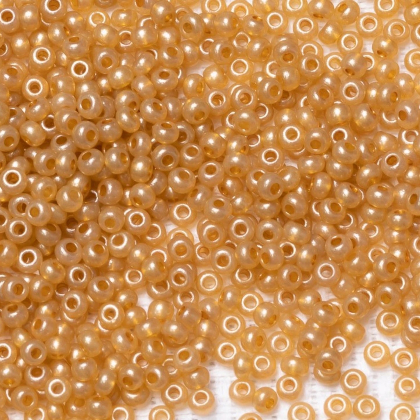 Perles de Rocaille en verre tchèque Preciosa 10/0 17784, 2,3 mm. Orange métallique albâtre - teinté terre.