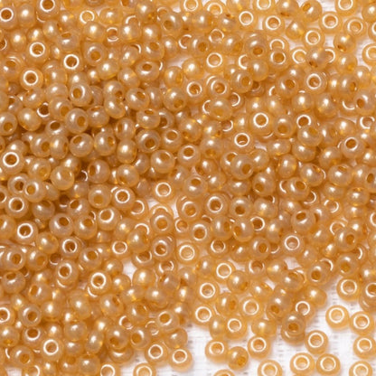 Perles de Rocaille en verre tchèque Preciosa 10/0 17784, 2,3 mm. Orange métallique albâtre - teinté terre.