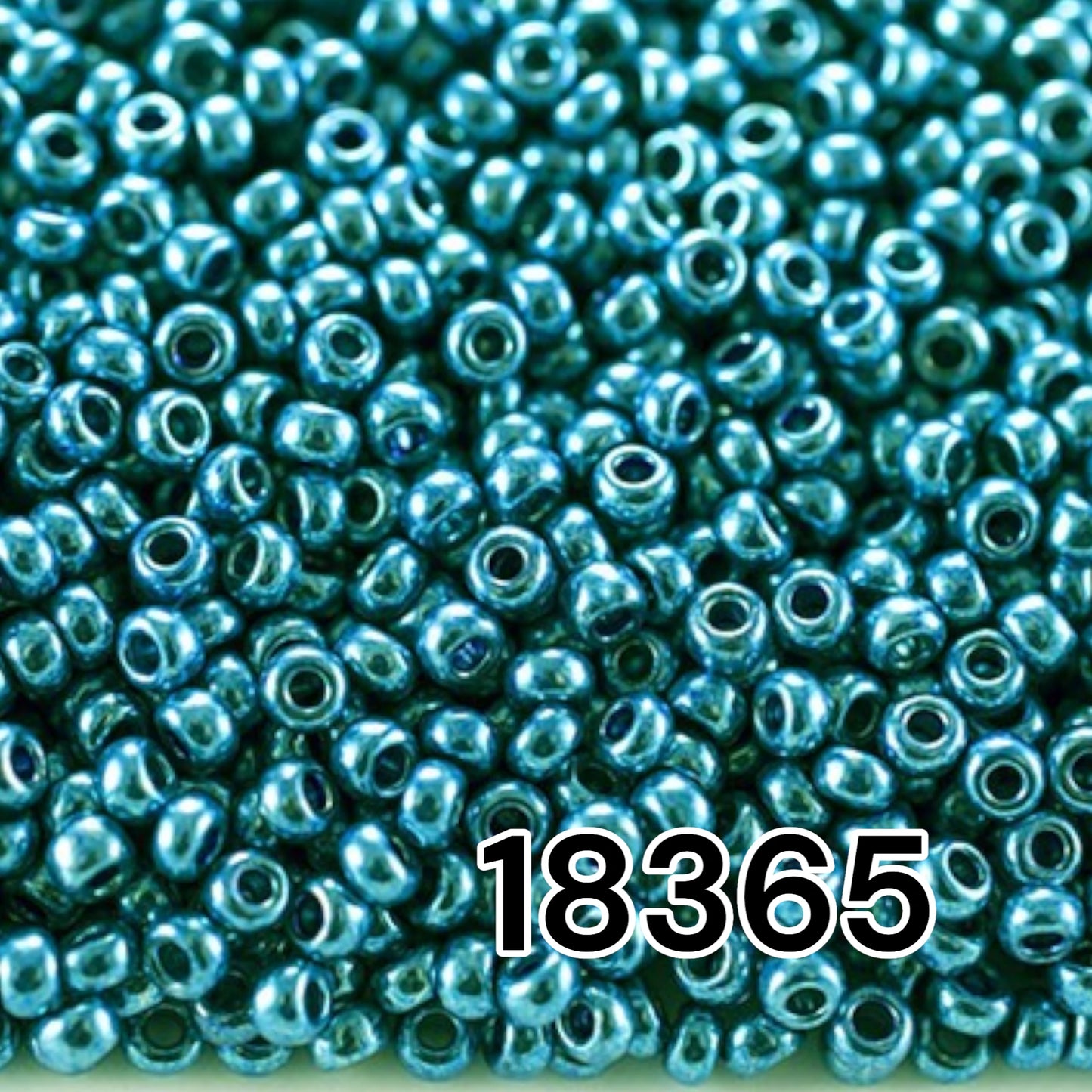 6/0 18365 Preciosa tschechische Glas Perlen Rocailles 4.1mm. Blau Grün Metallic.