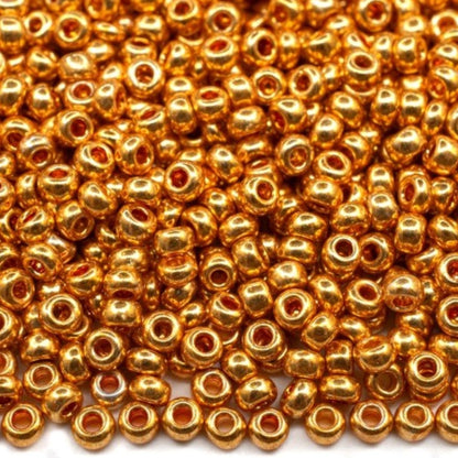 6/0 18389 Preciosa Чехски стъклени Малки Мъниста Рокайли 4.1mm. Златисто оранжев - Металик.