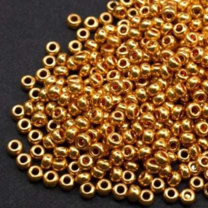 6/0 18389 Preciosa Чехски стъклени Малки Мъниста Рокайли 4.1mm. Златисто оранжев - Металик.