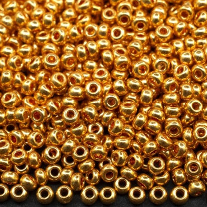 6/0 18389 Preciosa Чехски стъклени Малки Мъниста Рокайли 4.1mm. Златисто оранжев - Металик.
