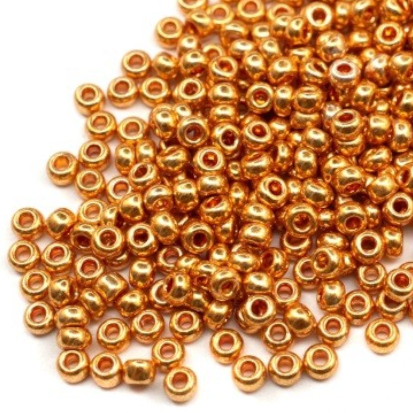 6/0 18389 Preciosa Чехски стъклени Малки Мъниста Рокайли 4.1mm. Златисто оранжев - Металик.