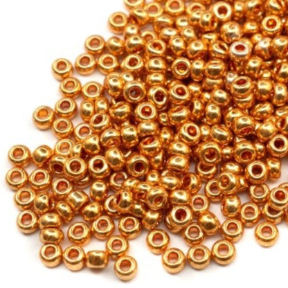 6/0 18389 Preciosa Чехски стъклени Малки Мъниста Рокайли 4.1mm. Златисто оранжев - Металик.