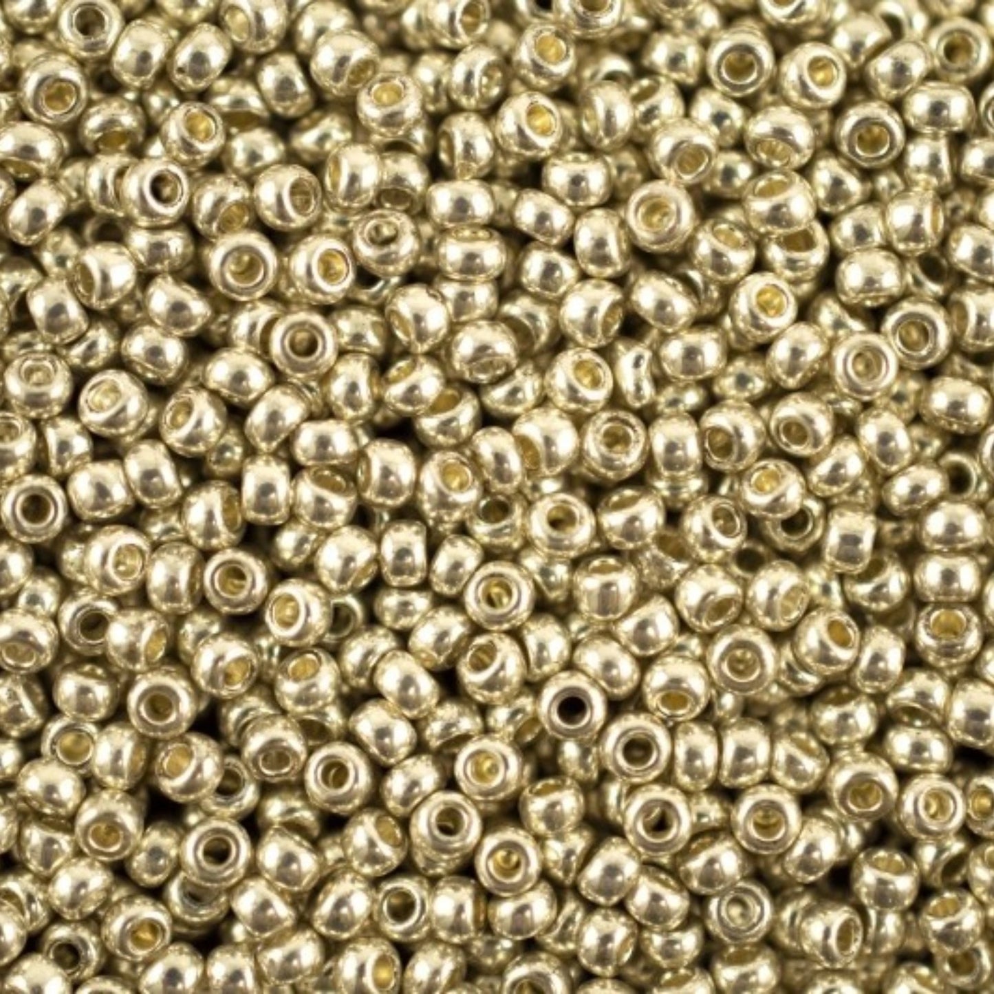 10/0 18503 Perles en verre tchèque Preciosa de Rocaille 2,3 mm. Métallique argenté - Teint terre.