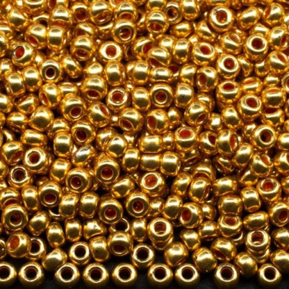 6/0 18581 Preciosa чешко стъкло Малки Мъниста Рокайли 4.1mm. Оранжево Златист Металик.