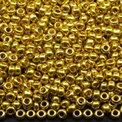 10/0 18586 Perline di vetro ceco Preciosa Rocaille 2,3 mm. Oro metallico - Terra tinto.