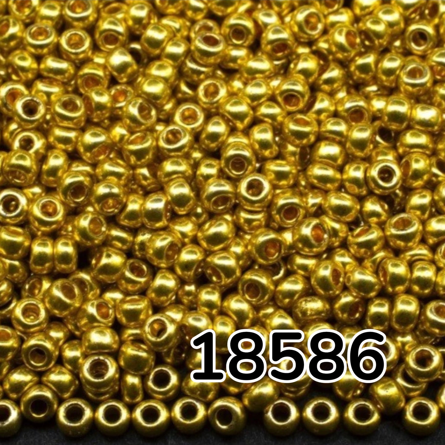 10/0 18586 Perline di vetro ceco Preciosa Rocaille 2,3 mm. Oro metallico - Terra tinto.