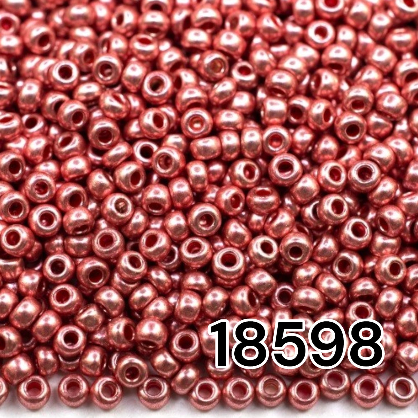 6/0 18598 Preciosa čehu stikla Pērlītes Rokaja 4.1mm. Sarkani rozā metāliskas.