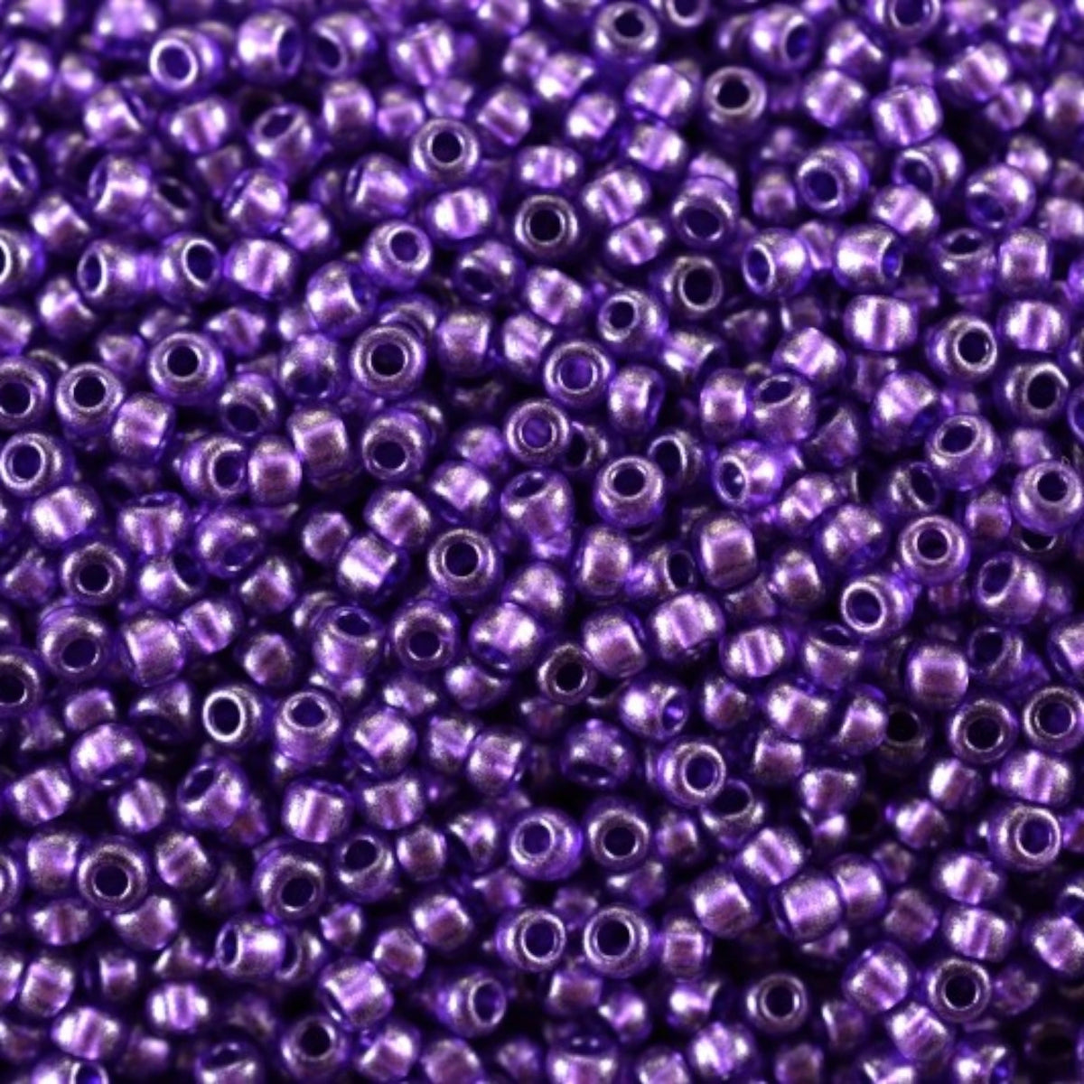 10/0 18928 Preciosa Perles de Rocaille en verre tchèque 2.3mm. Cristal teinté violet métallisé.
