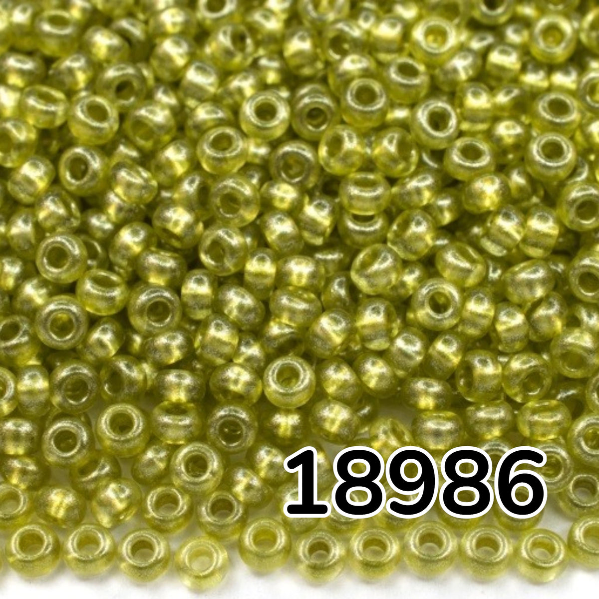 10/0 18986 Preciosa Tschechische Glasperlen Rocailles 2.3mm. Gelb metallisch gefärbter Kristall.
