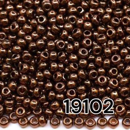 6/0 19102 Preciosa Czech Glass Perler Rocailles 4.1mm. Mørk Topas, Bronze Iris Sfinx.