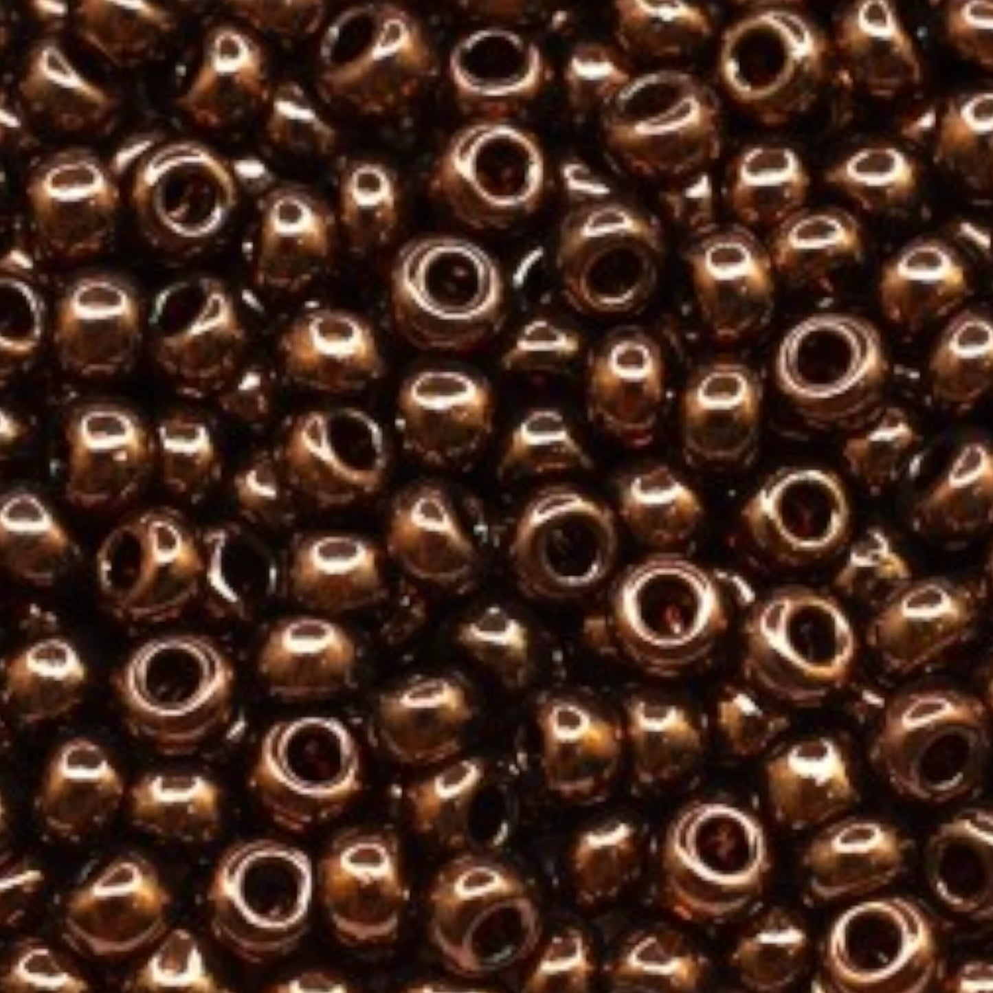 6/0 19102 Preciosa Czech Glass Perler Rocailles 4.1mm. Mørk Topas, Bronze Iris Sfinx.