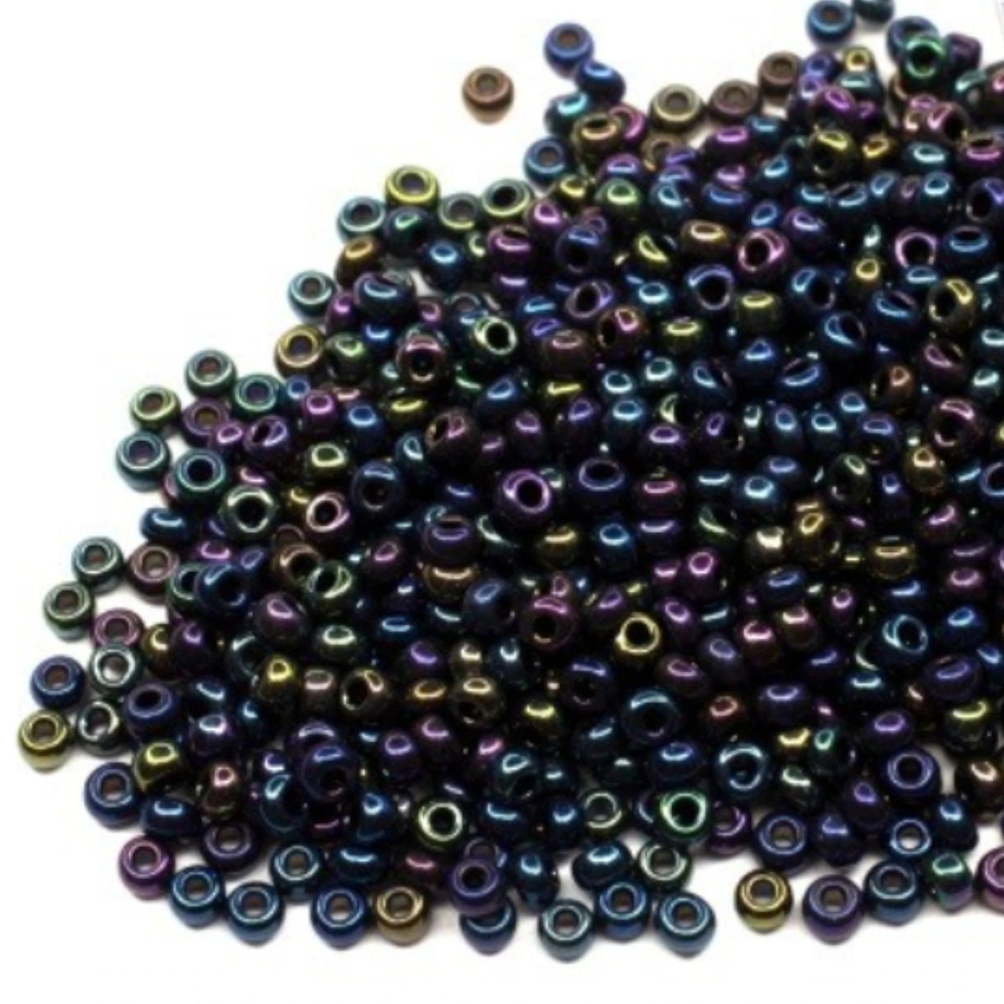10/0 19135 Preciosa tjeckiska glaspärlor rocaillepärlor 2,3 mm. Bronsblå iris.