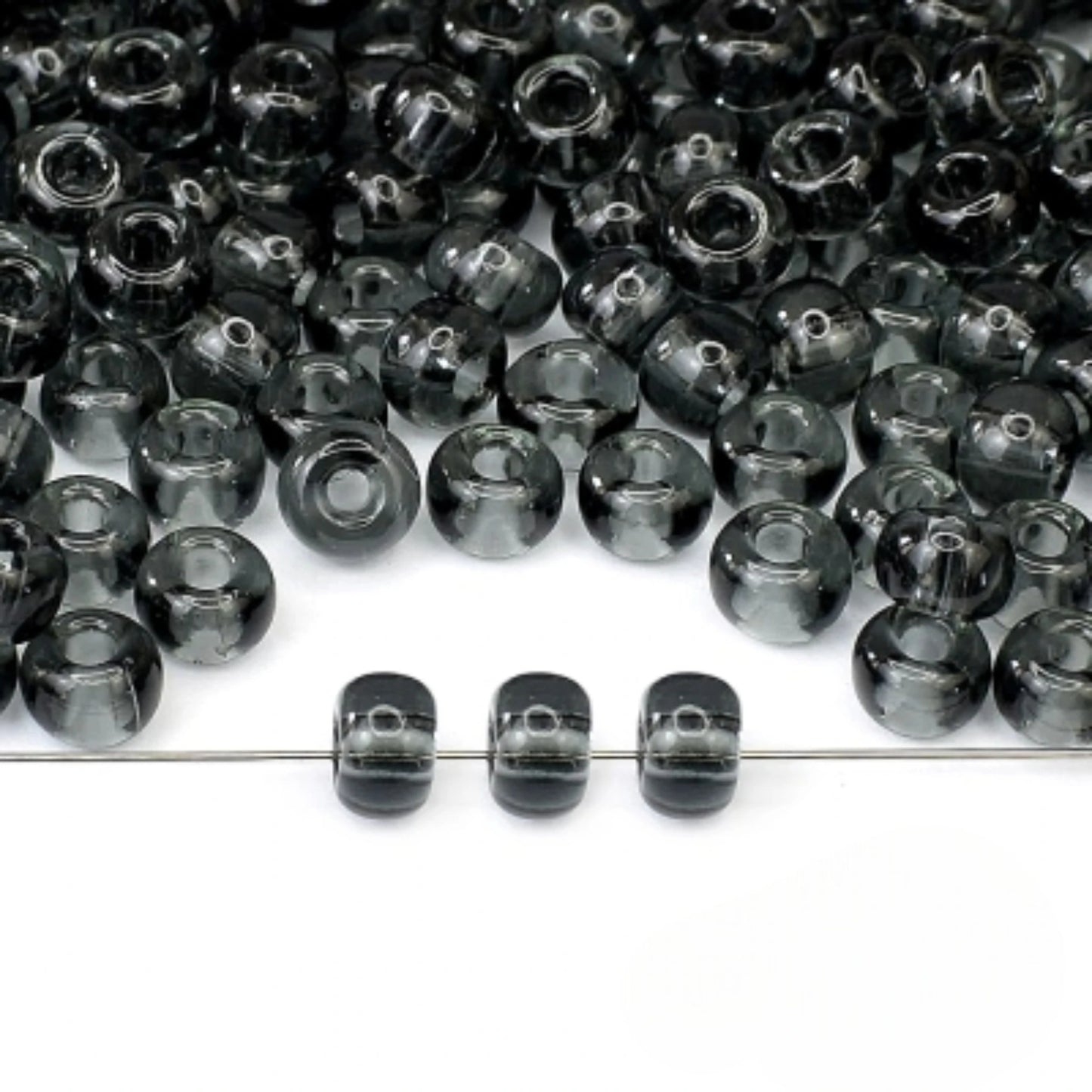 2/0 40010 Preciosa Çek Cam Kum Boncuğu Rocaille Boncuk 6.1mm. Şeffaf Gri.