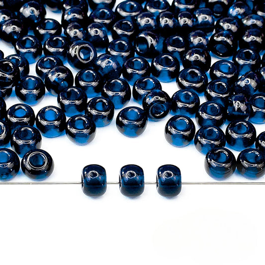 2/0 60100 Preciosa Чешское стекло Бисер Рокайль 6.1mm. Темный аквамарин.