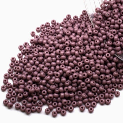 10/0 23020 Preciosa Seed Beads. Opaque purple.