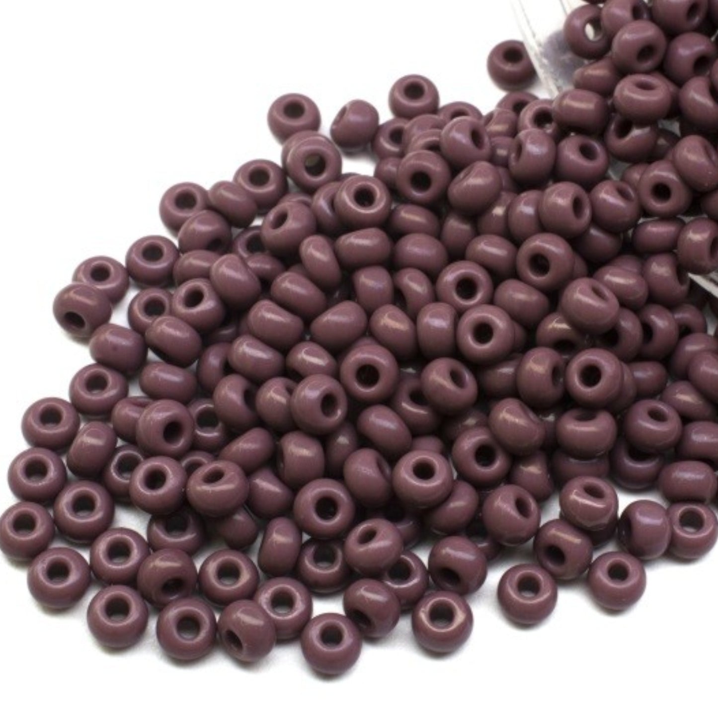 10/0 23040 Preciosa Seed Beads. Opaque purple.