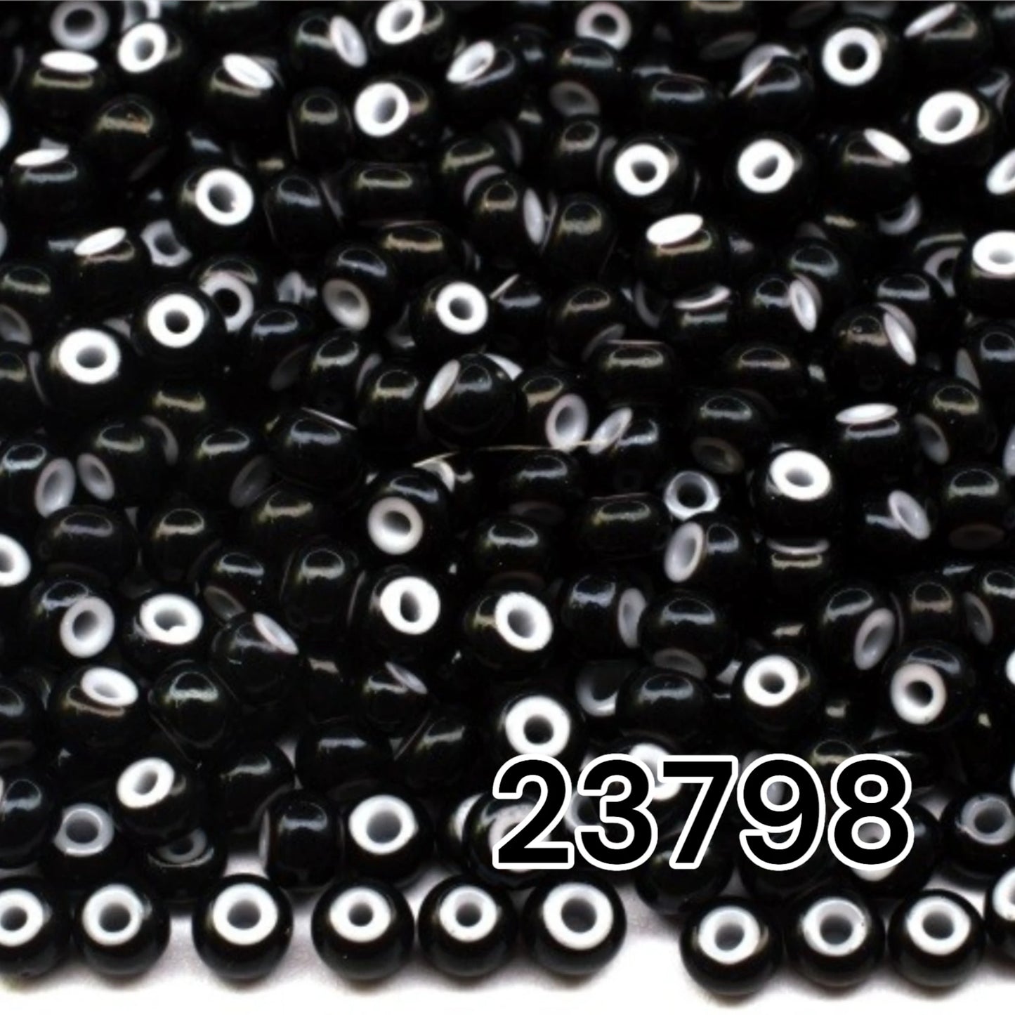 10/0 23798 Preciosa Seed Beads Rocailles. Black, White Lined.