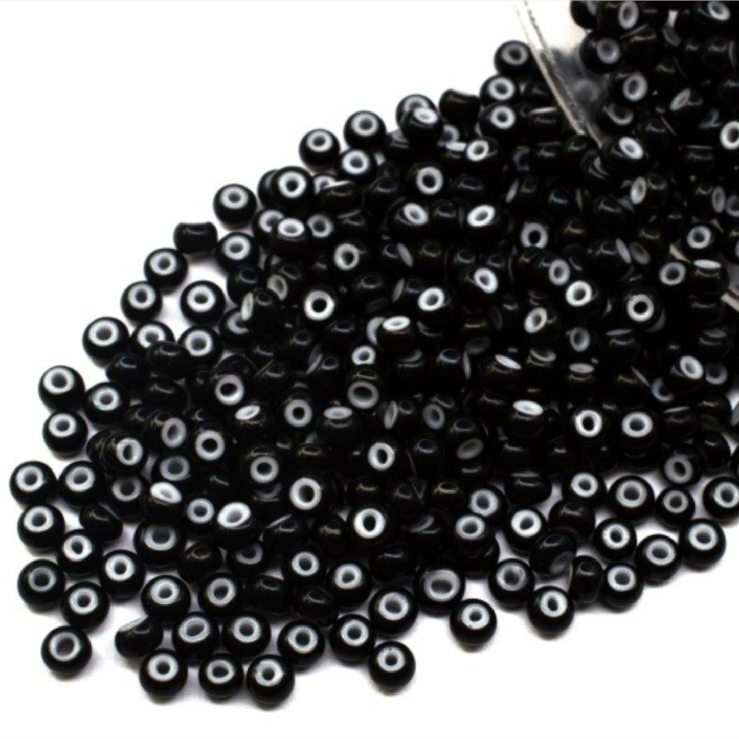 10/0 23798 Preciosa Seed Beads Rocailles. Black, White Lined.