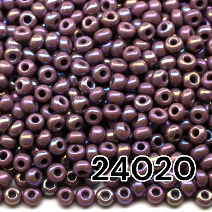 10/0 24020 Preciosa Seed Beads. Opaque rainbow purple.