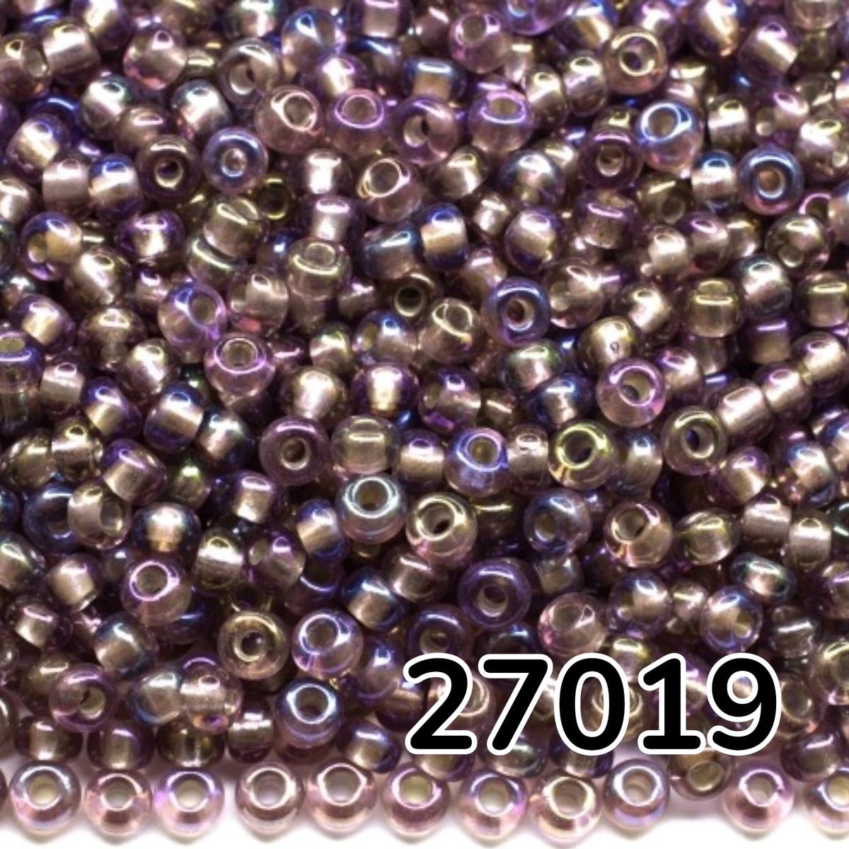 10/0 27019 Preciosa cseh üveg Magtartalmú Gyöngyök (Kásagyöngy) Rocailles 2.3mm. Világos ametiszt, átlátszó, ezüstözött, szivárványos.