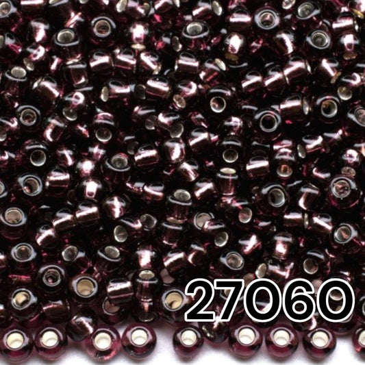 10/0 27060 Perles de graines Preciosa. Violet transparent doublé argent.