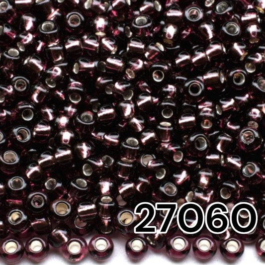 10/0 27060 Preciosa Seed Beads. Purple transparent Silver lined.