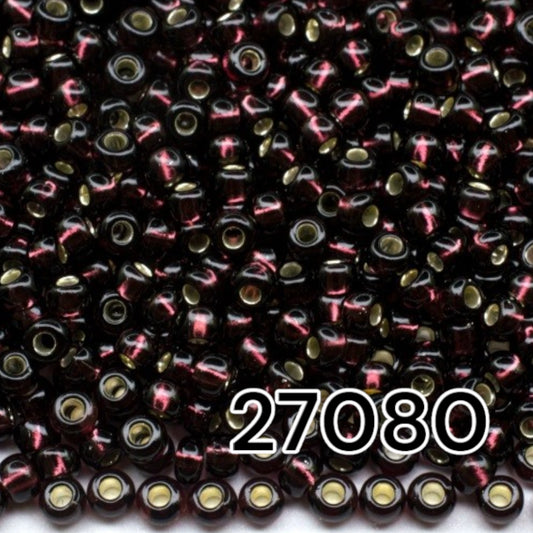 10/0 27080 Preciosa Seed Beads. Purple transparent Silver lined.