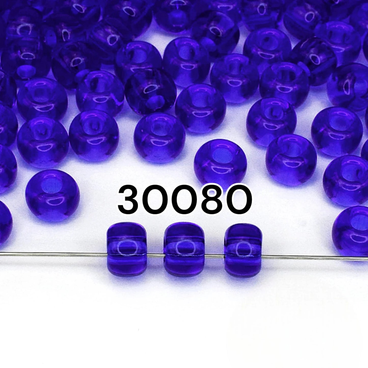 2/0 30080 Perles de Verre Tchèques Preciosa de Rocaille 6.1mm. Bleu Transparent naturel.