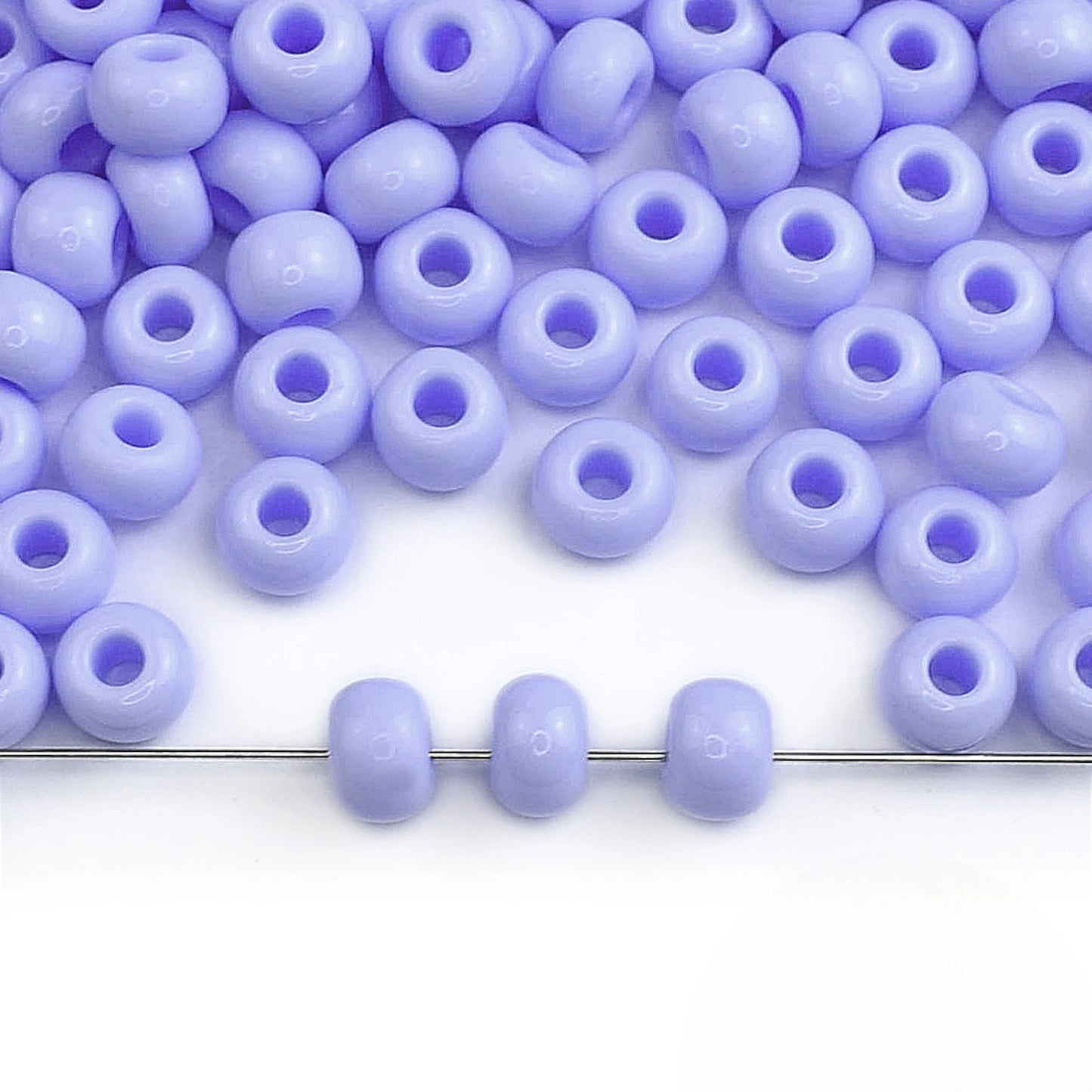 2/0 33000 Preciosa Seed Beads Light Blue. Opaque natural.