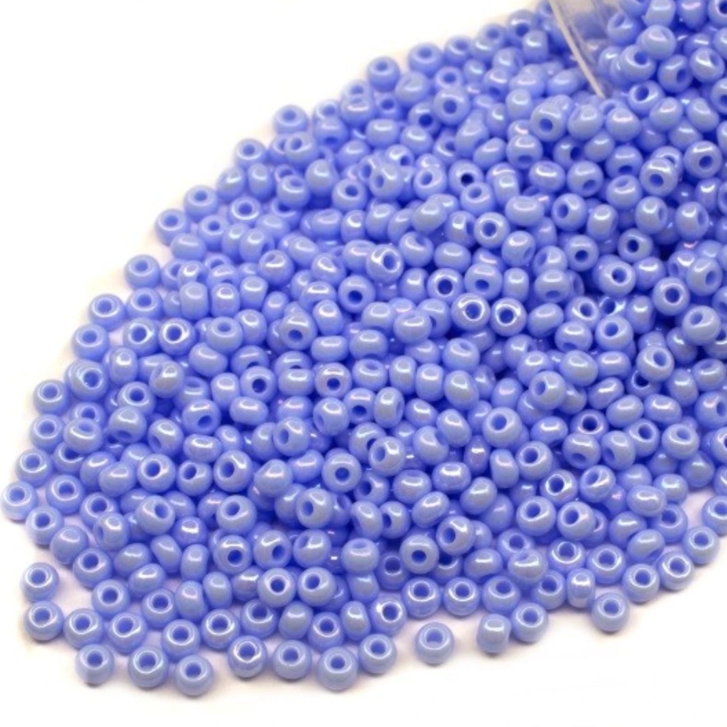 10/0 34000 Preciosa Seed Beads. Opaque rainbow light blue.