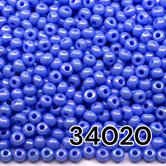 10/0 34020 Preciosa Seed Beads. Opaque rainbow light blue.