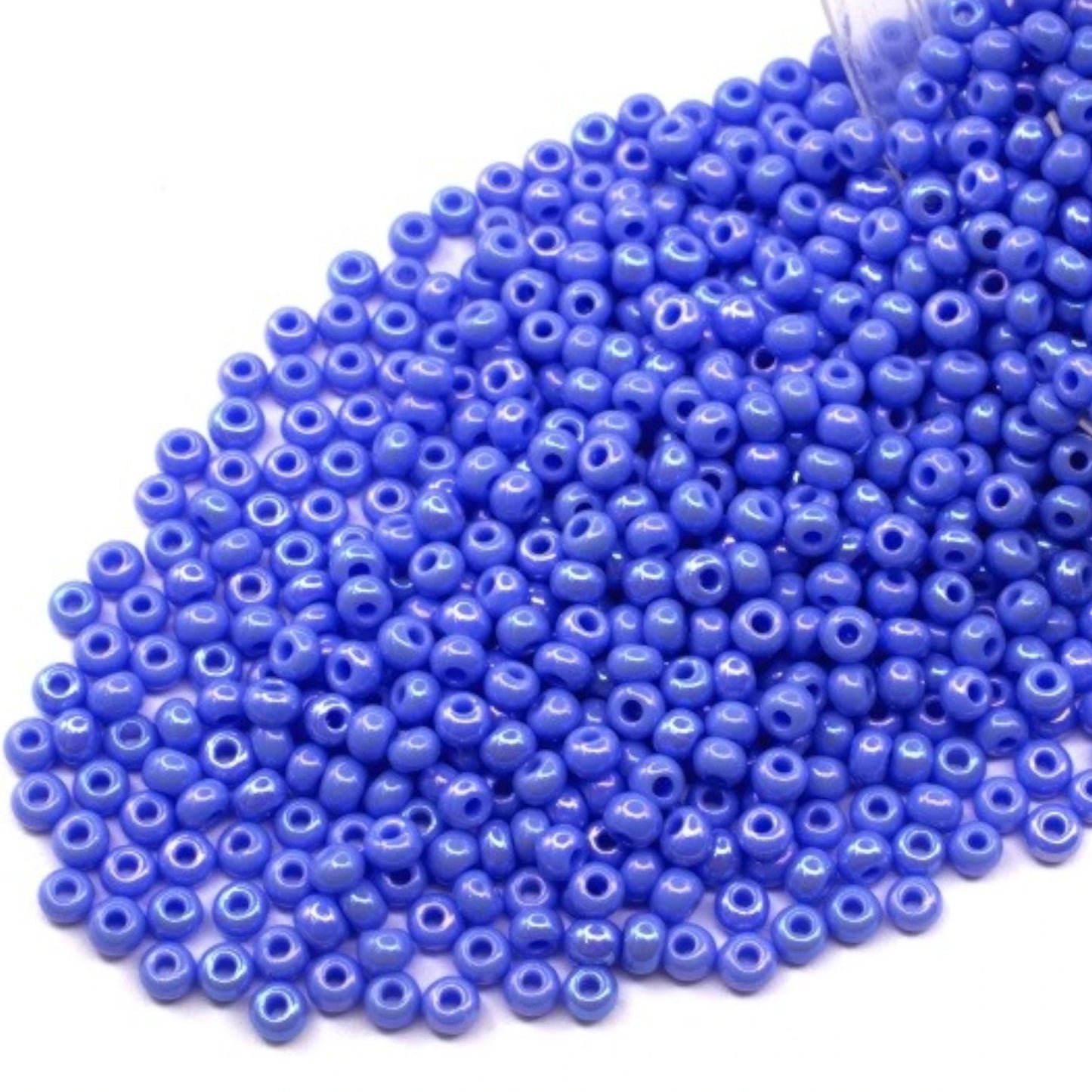 10/0 34020 Preciosa Seed Beads. Opaque rainbow light blue.