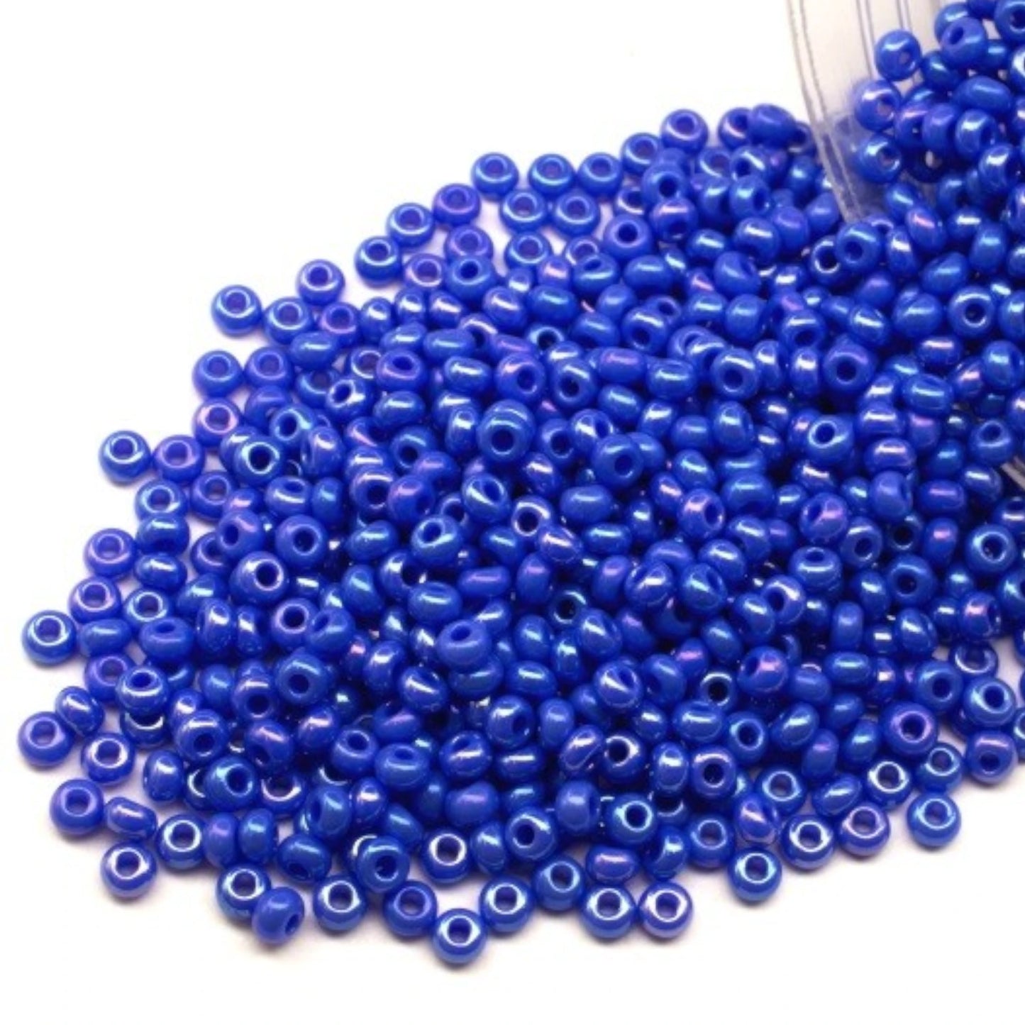 10/0 34040 Preciosa Seed Beads. Opaque rainbow blue.