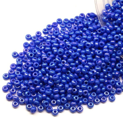 10/0 34040 Preciosa Seed Beads. Opaque rainbow blue.