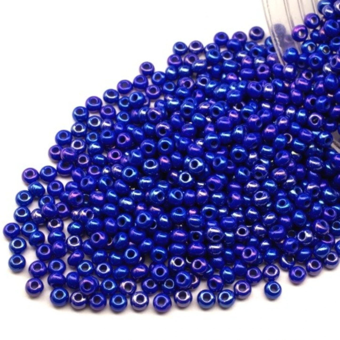 10/0 34050 Preciosa Seed Beads. Opaque rainbow blue.