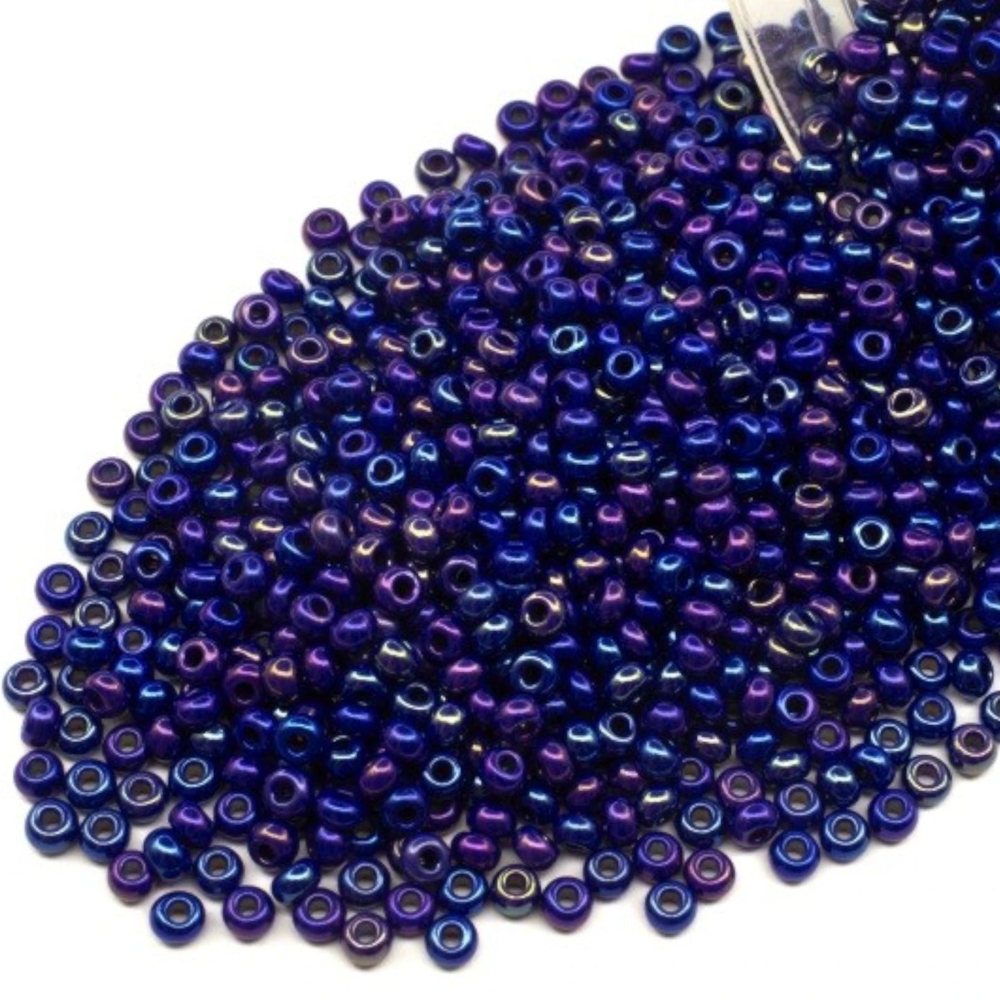 10/0 34070 Preciosa Seed Beads. Opaque rainbow blue.