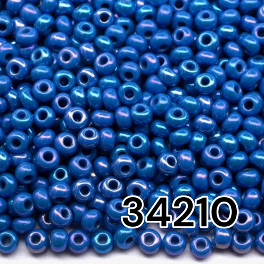 10/0 34210 Preciosa Seed Beads. Opaque rainbow blue.