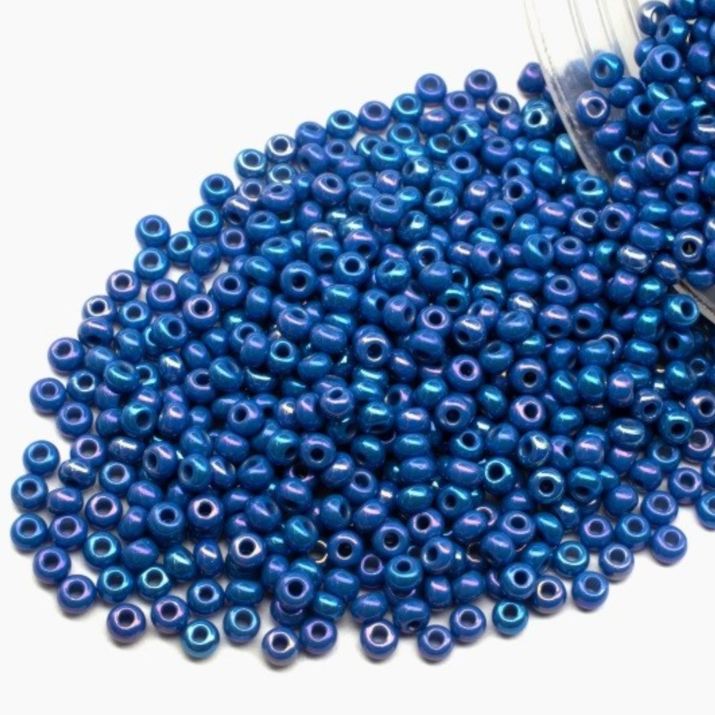 10/0 34210 Preciosa Seed Beads. Opaque rainbow blue.