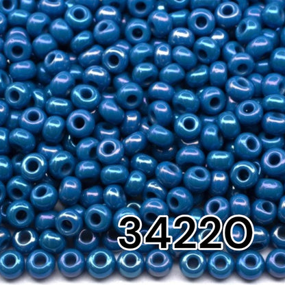 10/0 34220 Preciosa Seed Beads. Opaque rainbow blue.