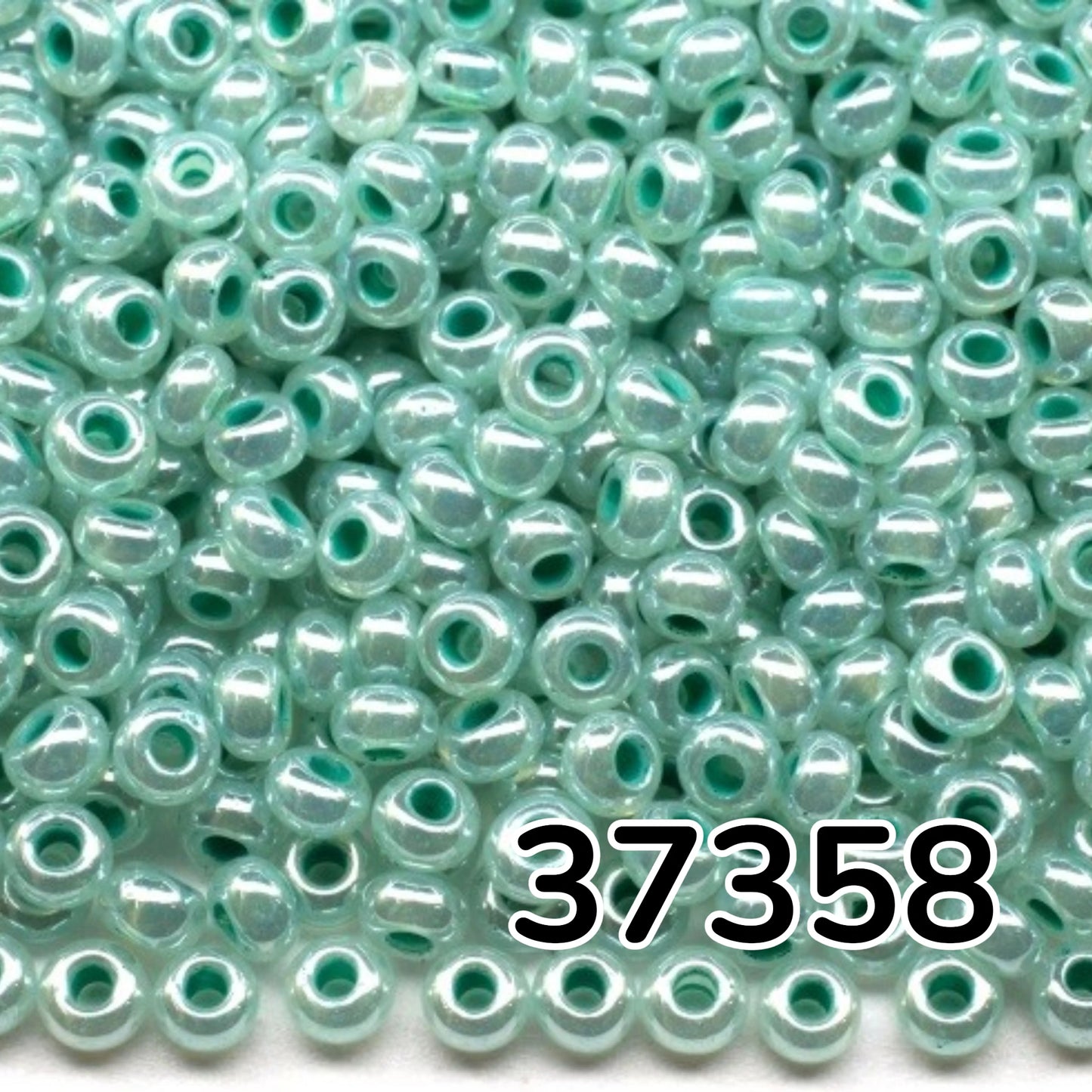 10/0 37358 Preciosa čehu stikla pērlītes rokaja 2.3 mm. Ceilona zaļā - Sfinksa krāsa ar zemes toni