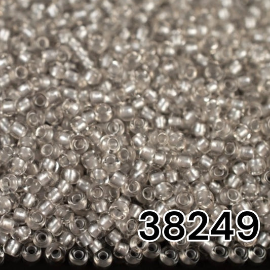 38249 Czech seed beads PRECIOSA Rocailles 10/0 grey. Crystal - Terra Pearl Lined.